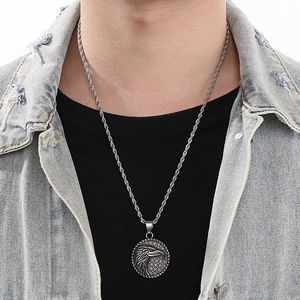 Nordic Viking eagle medallion necklace in vintage silver steel for men on a model