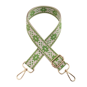 Adjustable wide shoulder strap for crossbody bags with green geometric snowflake pattern