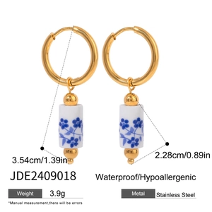 Golden stainless steel hoop earrings with blue and white porcelain beads for women