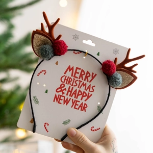 Serre-tête de Noël avec bois de renne, oreilles dorées et pompons pour décoration
