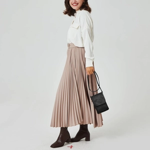 Elegant black PU leather mini phone bag shown on model in a professional studio setting