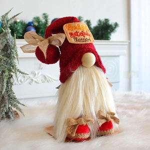 Cute Christmas gnome doll with red knitted hat and embroidered thankful grateful text