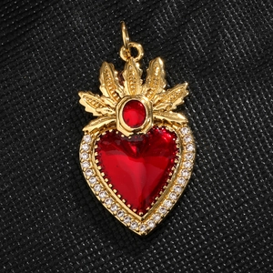 Luxurious gold-plated heart pendant with red zirconia and a regal crown fire design