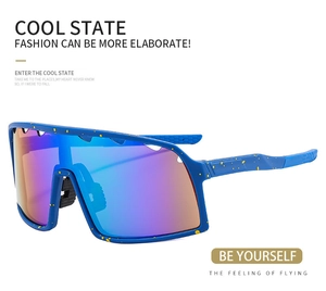 Detail of blue outdoor sports sunglasses frame with unique yellow speckled paint texture