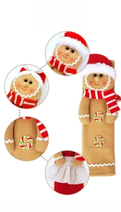 Detail of gingerbread man handle cover with red scarf and buttons for Christmas decor