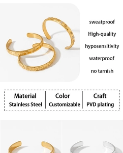 Detail of waterproof gold and silver stainless steel bangles with hypoallergenic PVD coating