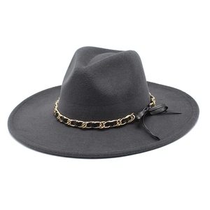 Detail of dark grey wool fedora with 9.5cm wide brim and decorative gold chain accent