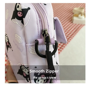 Macro shot of smooth zipper and Kuromi print on purple minimalist crossbody bag