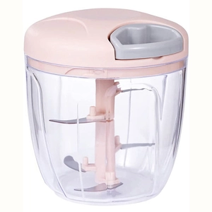 Macro detail of manual food processor with pink lid and multi-layer sharp steel blades