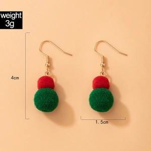Detail view of red and green plush ball earrings with dimensions and weight 3g