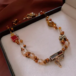 Vintage floral ceramic beaded layered necklace with amber beads and plum blossom pendants