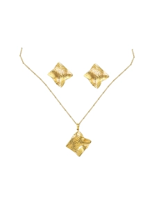 Macro detail of gold rhombus jewelry set featuring unique hammered metal texture finish