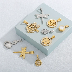 Assorted stainless steel tree of life and dragonfly pendants with rhinestones in gold and silver