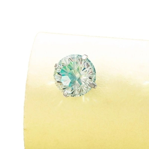Green zircon screw stud earring in four-prong titanium steel setting for ear piercing