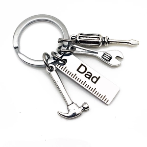 Father's Day stainless steel keychain set with Dad engraved charms and tool pendants