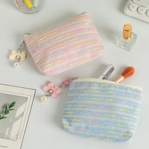 Cute tweed makeup and coin pouches in pink and blue with elegant bow pearl charms