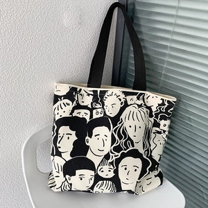 Borsa tote in tela con illustrazione artistica di ritratto e manici neri a contrasto