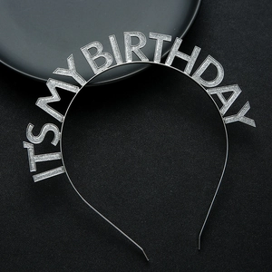 Close-up of silver glitter IT'S MY BIRTHDAY headband with rainbow drip oil finish