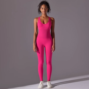Detail of rose pink seamless yoga jumpsuit featuring ribbed texture and high elasticity