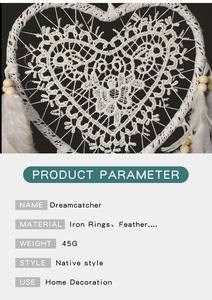 Detailed view of heart-shaped white dreamcatcher with soft feathers and specifications