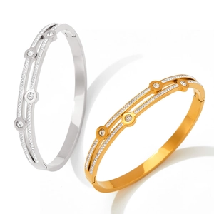 Double-row stainless steel bangle with sparkling rhinestones in gold and silver finish