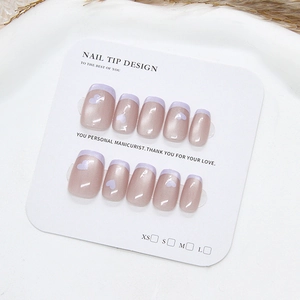 Handmade taro purple French cat eye press-on nails with heart patterns on display card