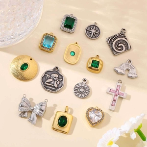 Französische Schleifen Herz und Kreuz Anhänger aus Gold und Silber Edelstahl Mix