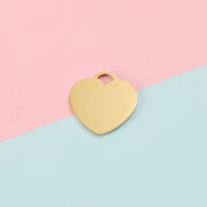 Polished golden heart-shaped pendant with smooth mirror finish and bail for DIY jewelry