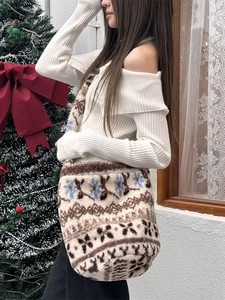 Winter plush floral bucket bag with large capacity for women on a festive background