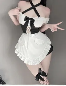 Detail of maid cosplay set with lace bralette, large bow, and white ruffled apron