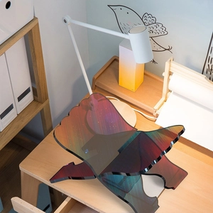 Modern acrylic book stand featuring a colorful galaxy nebula design for study desks