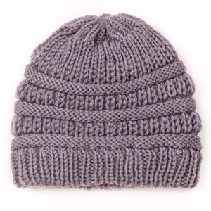 Close-up of grey knitted baby hat showing thick ribbed texture and warm weave detail