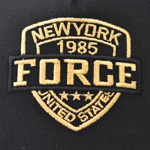 Cotton baseball cap with gold FORCE New York 1985 embroidery on black fabric