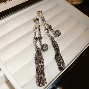 Silver fringe tassel earrings with grey and olive crystals in a vintage french style