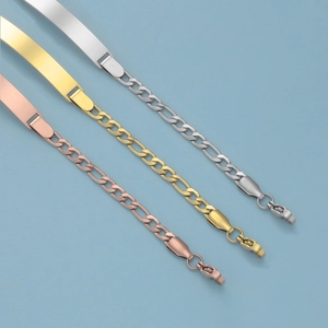 Detailed view of polished stainless steel Figaro chains for kids in silver, gold and rose gold