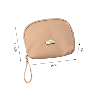 Detailed dimensions of beige semi-circle makeup bag showing 16x11.5x4cm size