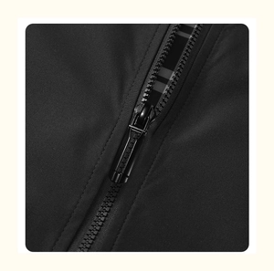 Close-up of high-quality black metal zipper and textured fabric of a men's sports jacket