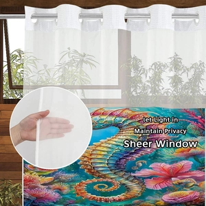 Sheer window curtain detail showing seahorse print and semi-transparent fabric texture