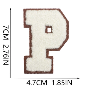 Macro detail of brown and white chenille letter P patch with dimensions 7cm by 4.7cm