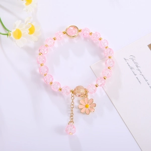 Pink crackle bead flower bracelet with gold accents and daisy floral design accessories