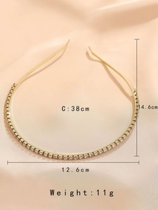 Detailed view of gold metal headband with rhinestone dimensions 38cm 14.6cm 12.6cm 11g