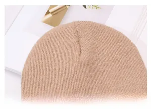Detailed close-up showing precise top stitching and knit texture of the beanie hat