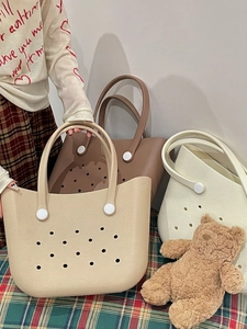 Three versatile EVA tote bags in beige, brown, and white with breathable hole design