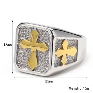 Vintage stainless steel cross ring in silver and gold tone with stone texture details