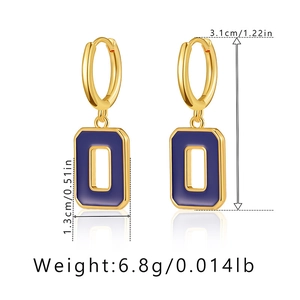 Detailed macro view of 18K gold-plated brass rectangle earrings with blue enamel