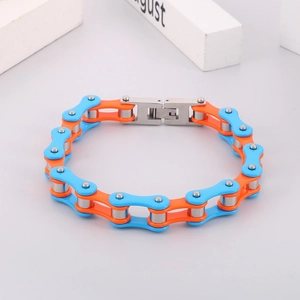 Detail of bicycle chain bracelet with orange and blue links and silver rollers