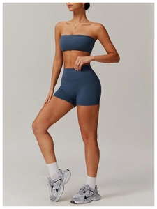 Detailed texture of seamless blue sports set with tube top and high waist shorts