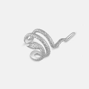 Detailed view of silver snake-shaped cuff earring with realistic scale texture