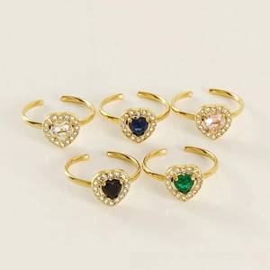 Flat lay of double-layer adjustable heart-shaped zircon rings in five vibrant colors