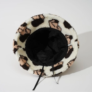 Faux lamb wool leopard print bucket hat for winter featuring adjustable inner drawstrings